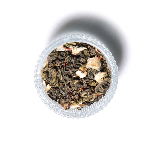 Watermelon Oolong loose leaf tea in a ramekin