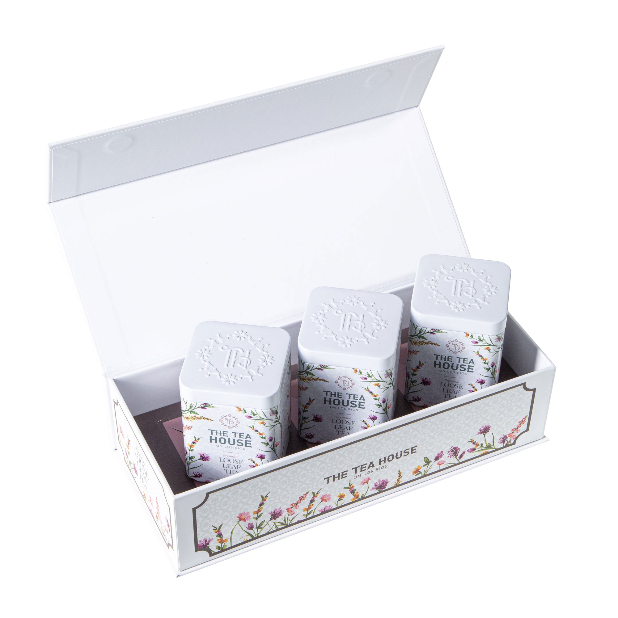 The Tea House on Los Rios custom gift box featuring three of our loose leaf tea tins