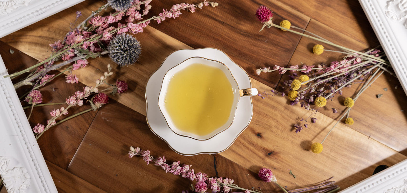 A Cup Of Tea With Floral Decor