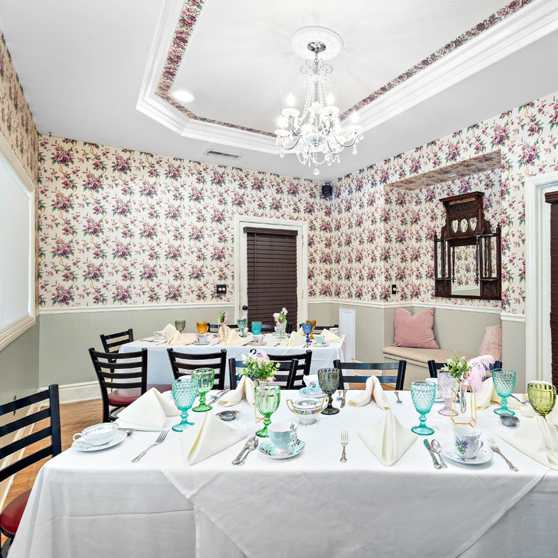 The Salon Venue Space with black ladder chairs