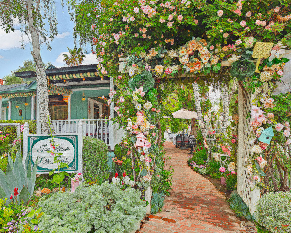 The Tea House on Los Rios front entrance arch walkway full of flowers, walkway to afternoon tea