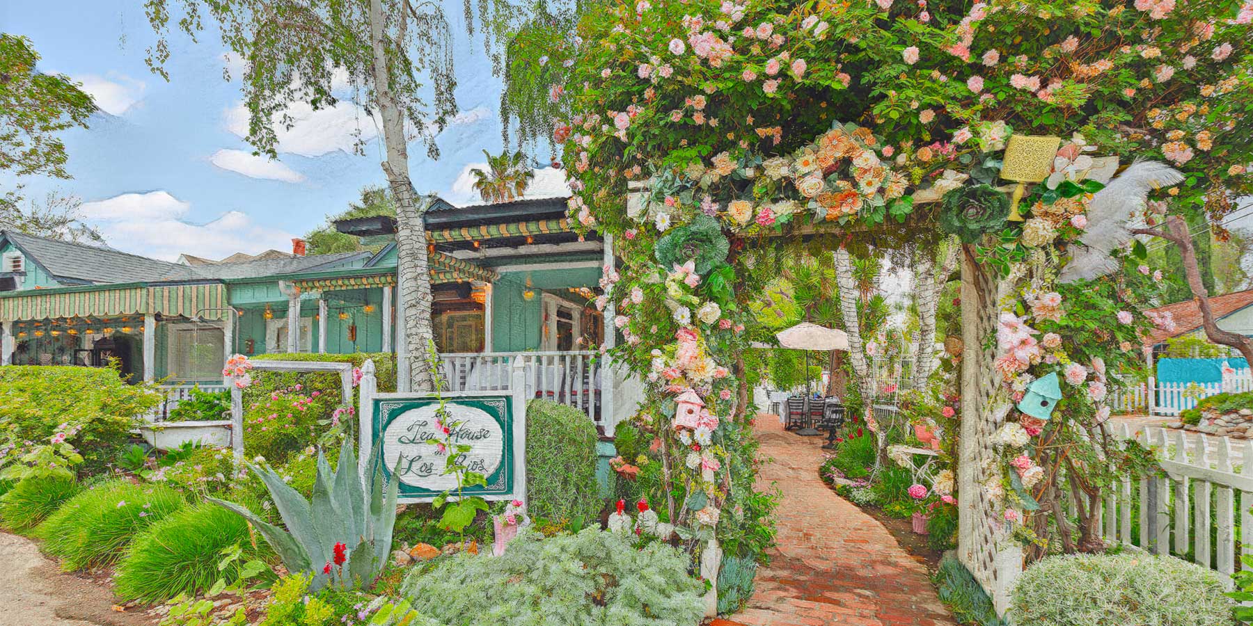 The Tea House on Los Rios front entrance painting showing the front arch walkway full of flowers