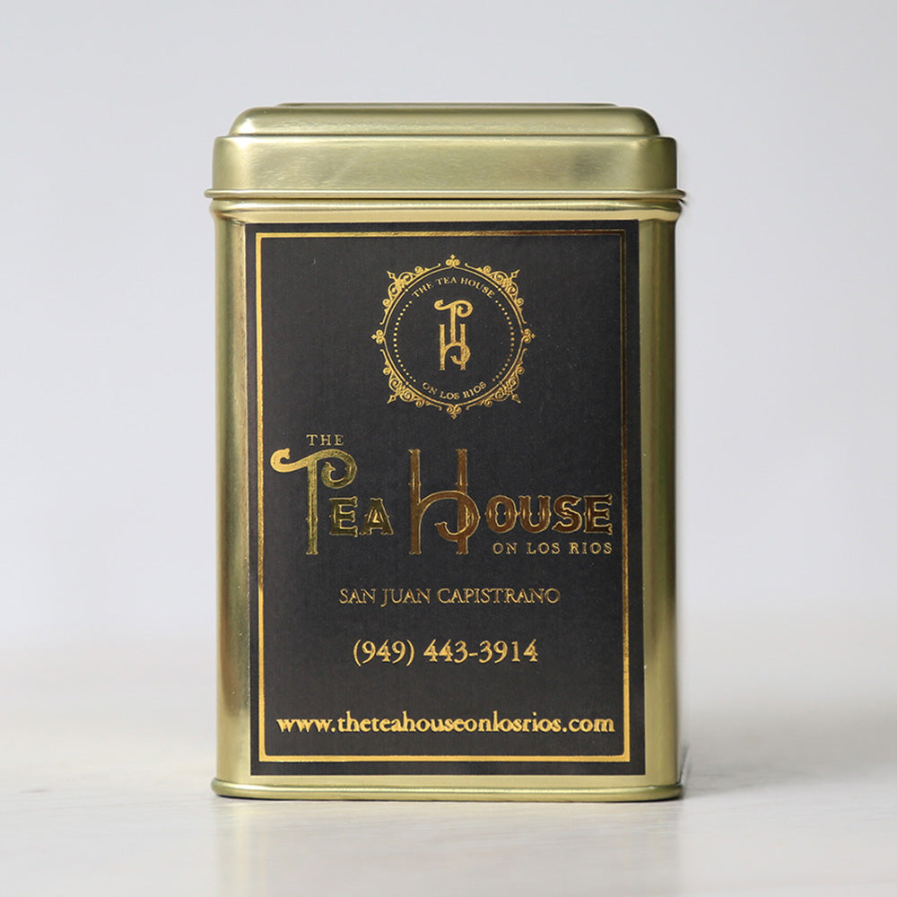 The Tea House on Los Rios gold tea tin