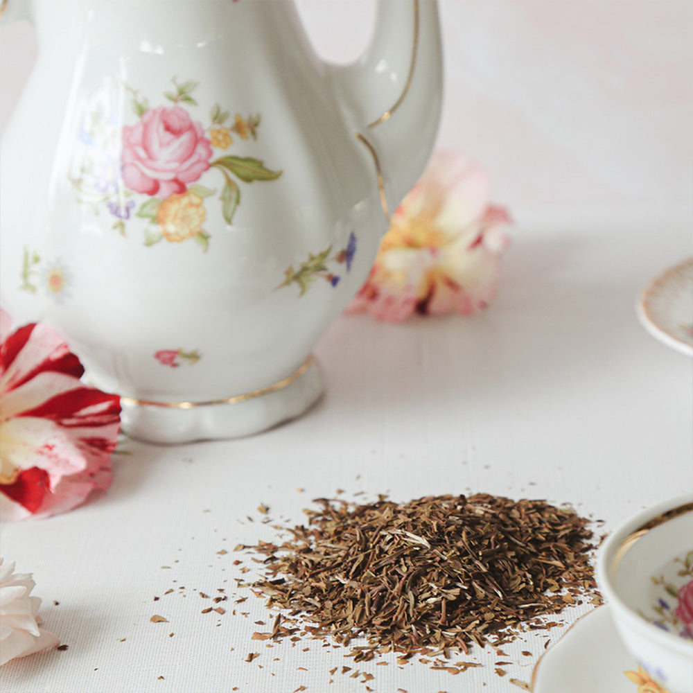 White Tea With Tea Pot and Flowers